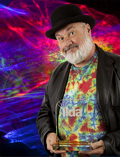 Laser Artist Mike Gould
holding his ILDA Award